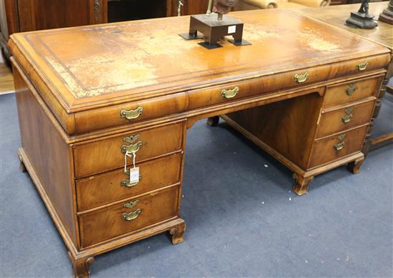 A 1930s walnut pedestal desk, W.170cm D.84cm H.76cm